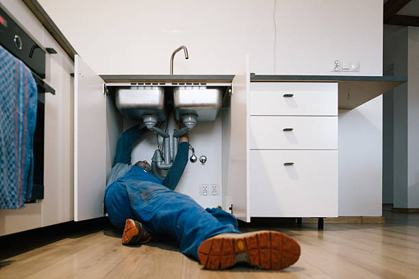 Professional Drain Cleaning technician working in Fortville, IN